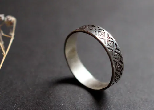 Tribal, bague symbole andin en argent