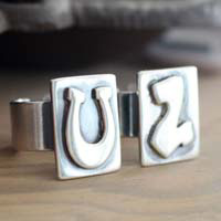 U2, bague logo de l’album Achtung Baby en argent