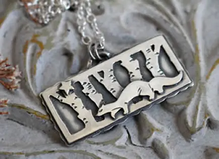Pendentif Suivre son étoile avec une belette, reflet de l’affection et de la vigilance pour les celtes