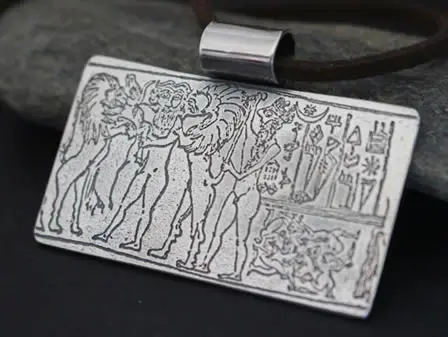 Collier le sceau-cylindre du Roi de Kisch qui montre une aventure du roi héros Gilgamesh