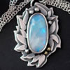 Les propriétés de la labradorite blanche ou pierre de lune arc-en-ciel