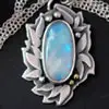 Les caractéristiques et propriétés physiques de la pierre de lune arc-en-ciel ou labradorite blanche